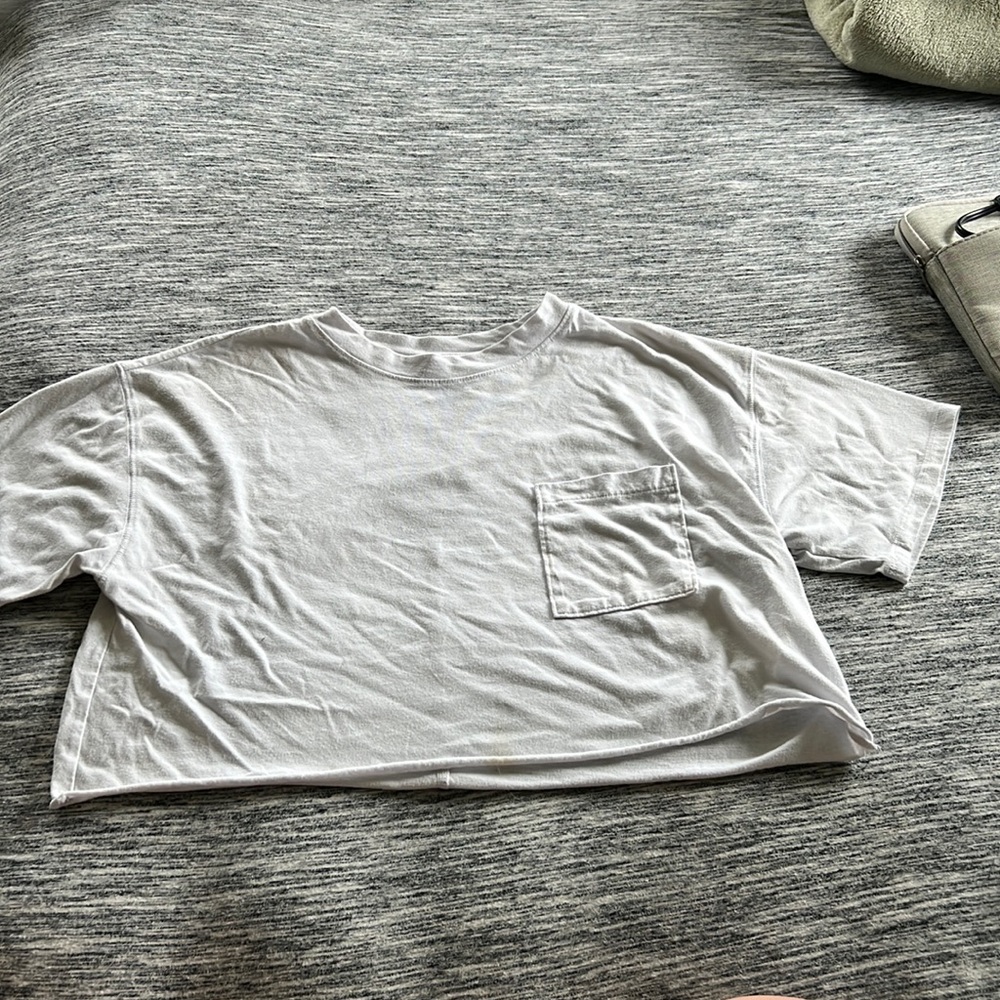 size large, doesn’t fit my style, and also had a small stain on the front.